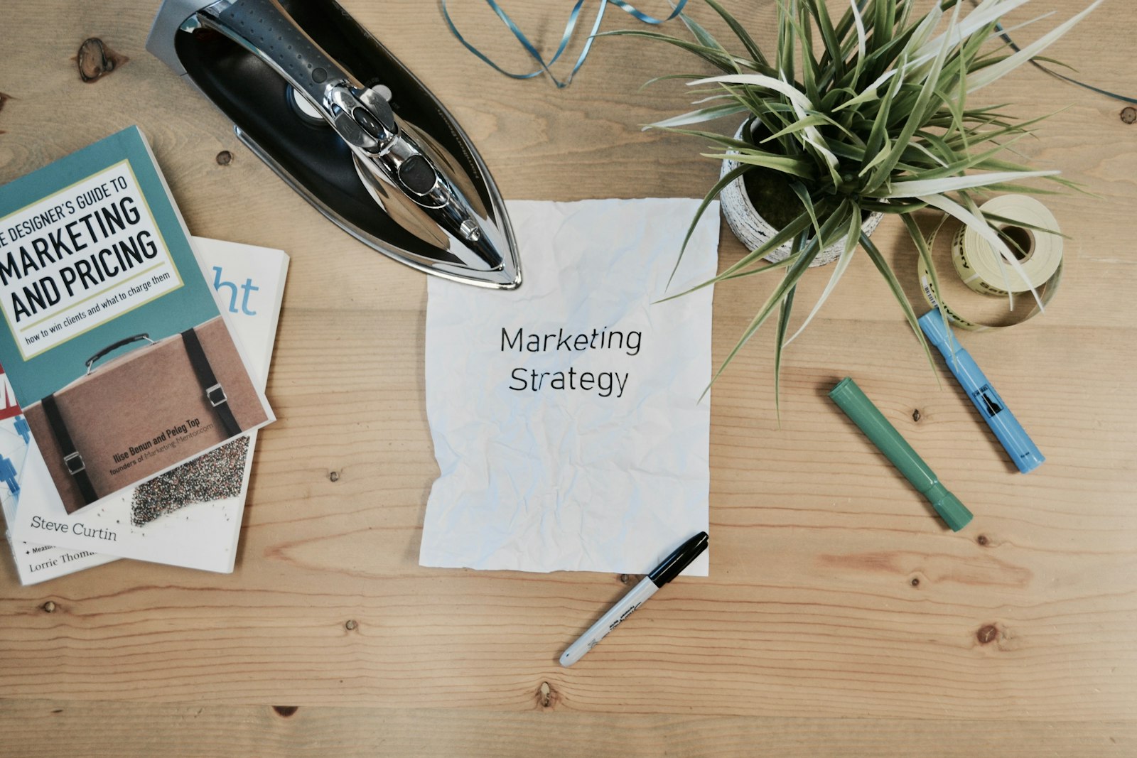 A handwritten marketing strategy note on a desk