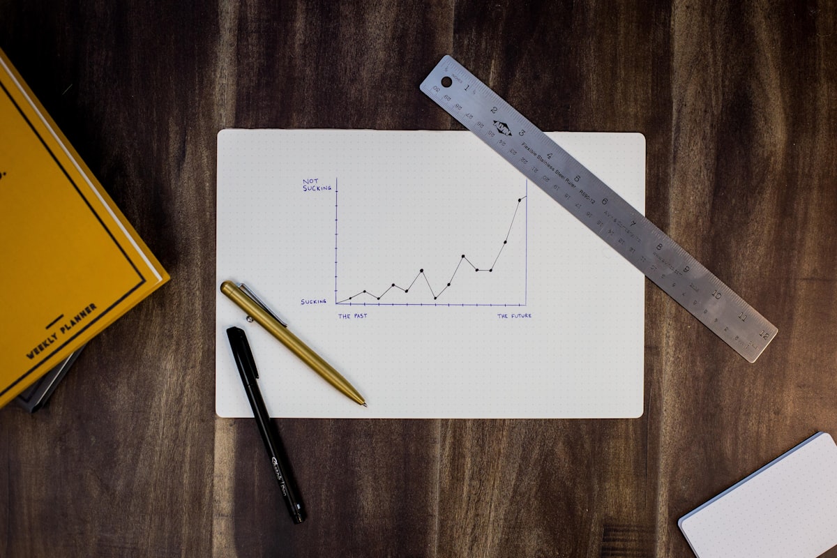 A hand-drawn growth chart on a desk